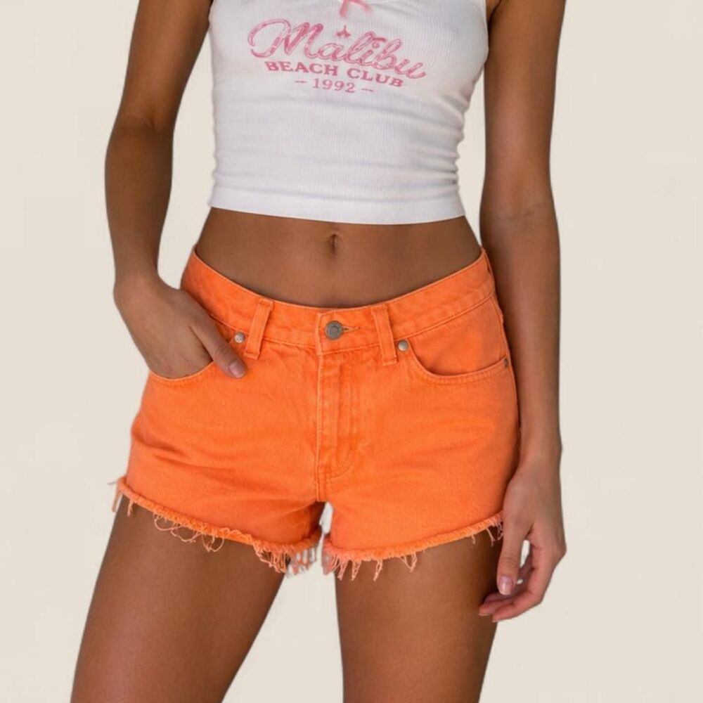 Levi’s 900 series vintage orange Jean cut off shorts | 25”